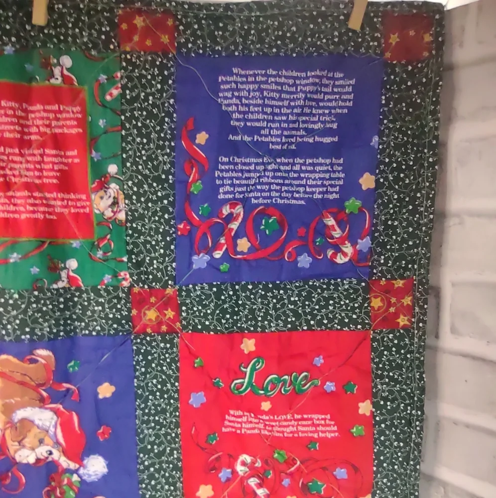 Festive Holiday Lap Quilt with Red, Green, and Blue Patterns
